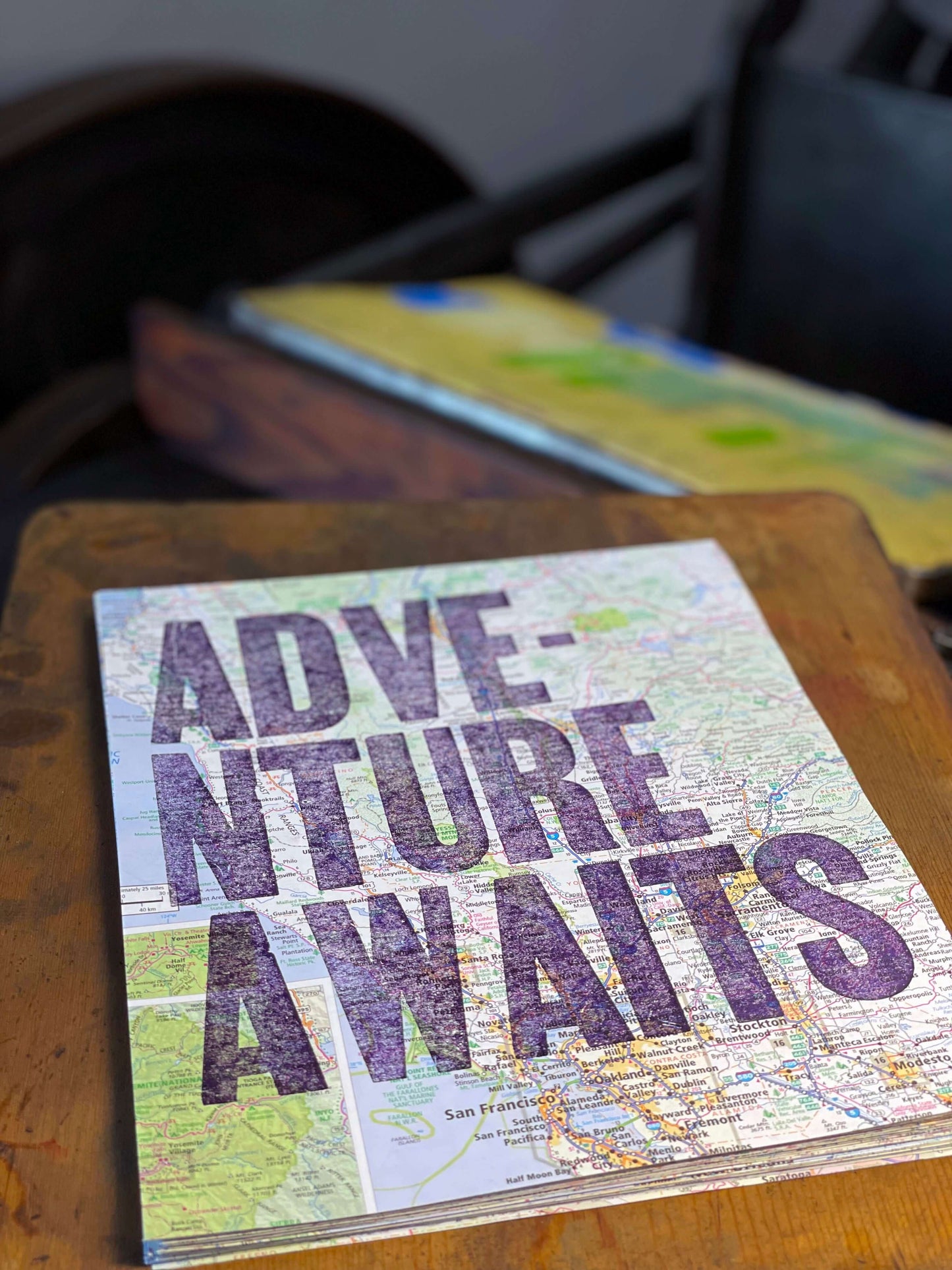 Adventure Awaits - 8x10 Letterpress print on road map with The Rugged Press in background